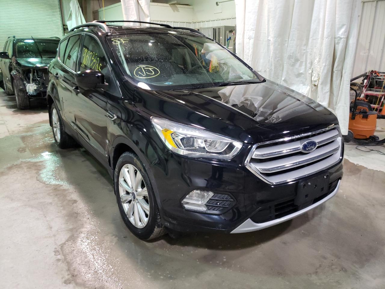 FORD ESCAPE SEL 2019 with VIN 1FMCU9HD8KUA23529 - Photo from auction