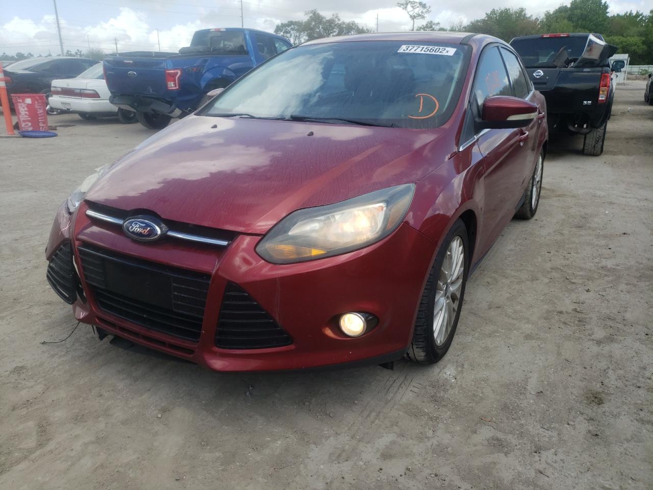 Photo 2 from auction – 2014 FORD FOCUS TITA with VIN 1FADP3J20EL417077