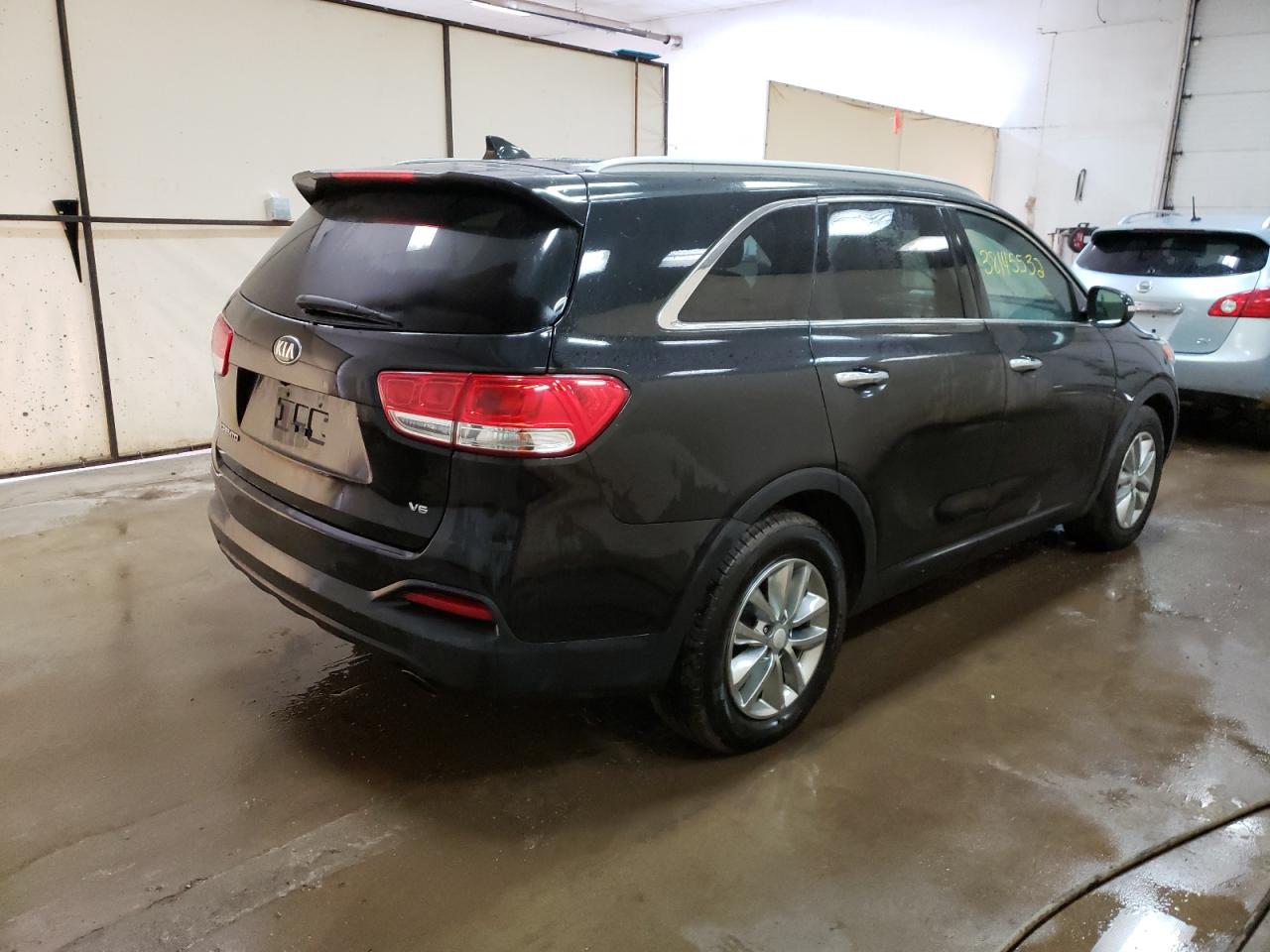 Photo 4 from auction – 2016 KIA SORENTO LX with VIN 5XYPG4A54GG182835