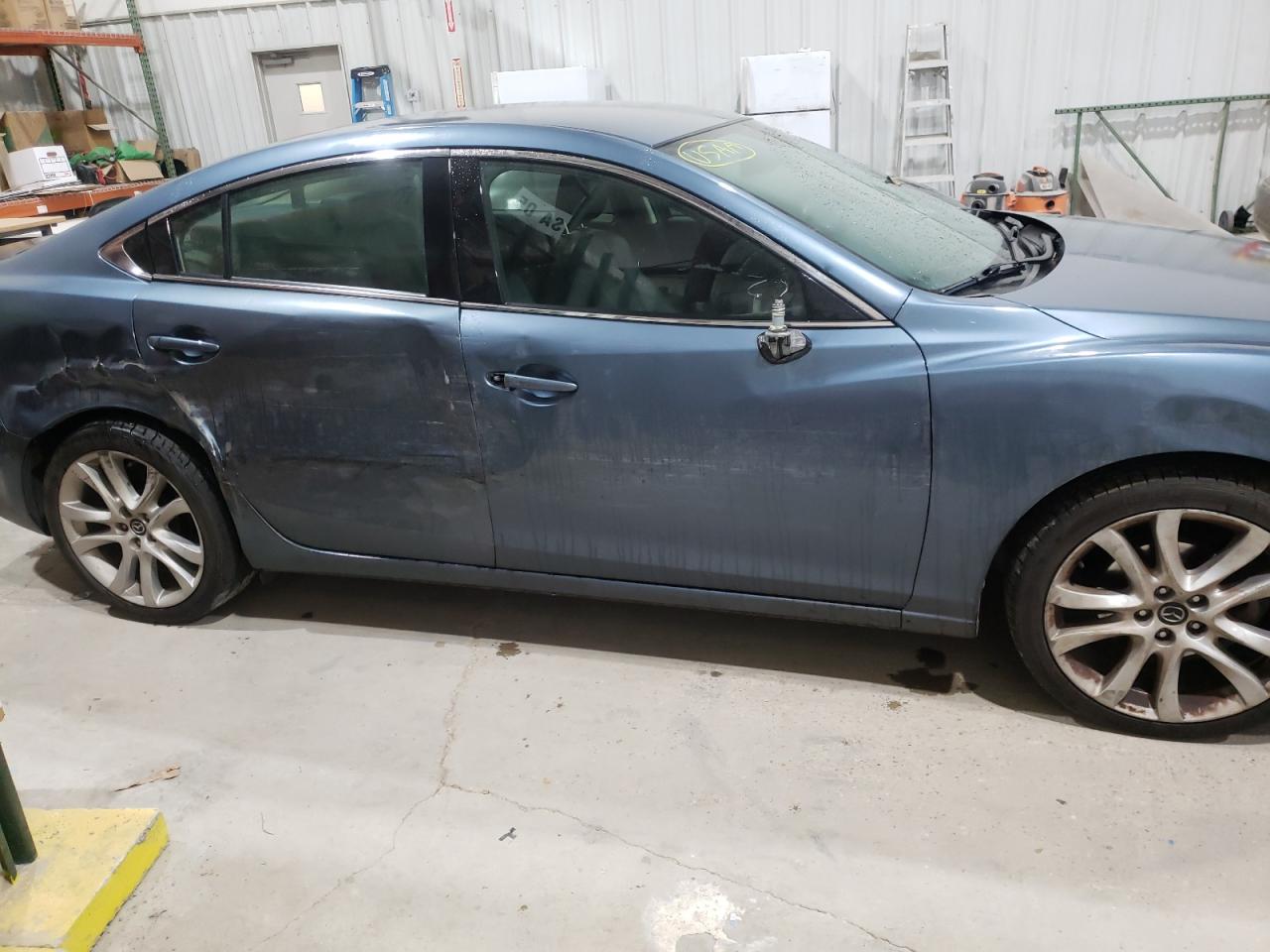 Photo 9 from auction – 2014 MAZDA 6 TOURING with VIN JM1GJ1V6XE1117861