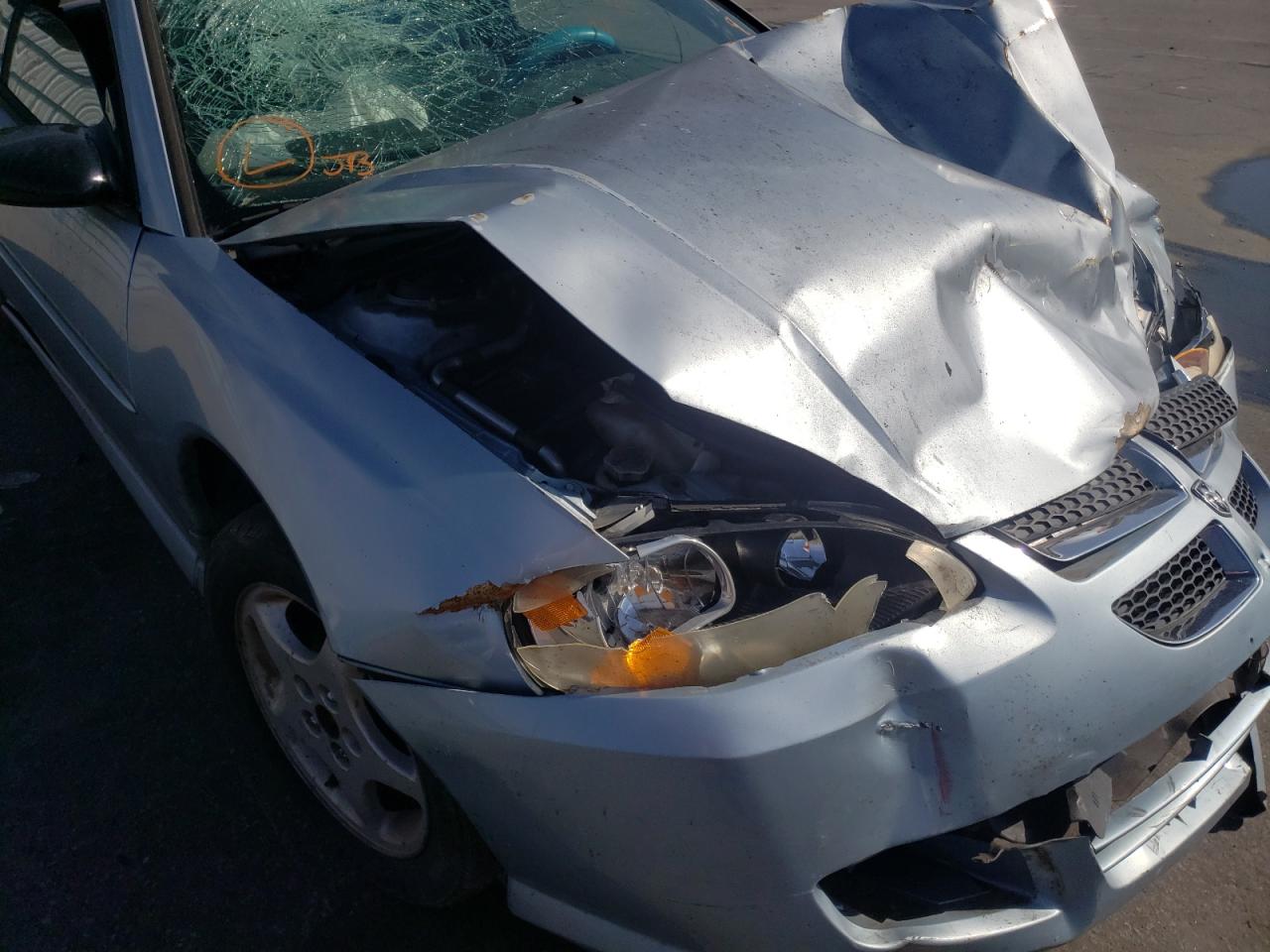Фото 10 с аукциона – 2004 DODGE STRATUS SX с VIN 4B3AG42G04E140883