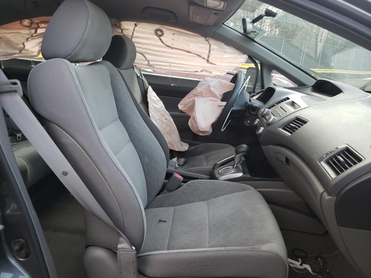 Photo 5 from auction – 2011 HONDA CIVIC LX with VIN 19XFA1F50BE036068