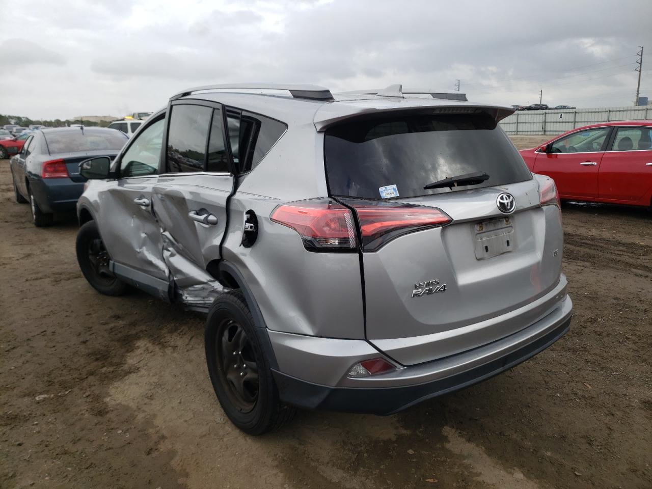 Photo 3 from auction – 2018 TOYOTA RAV4 LE with VIN 2T3ZFREV7JW459358