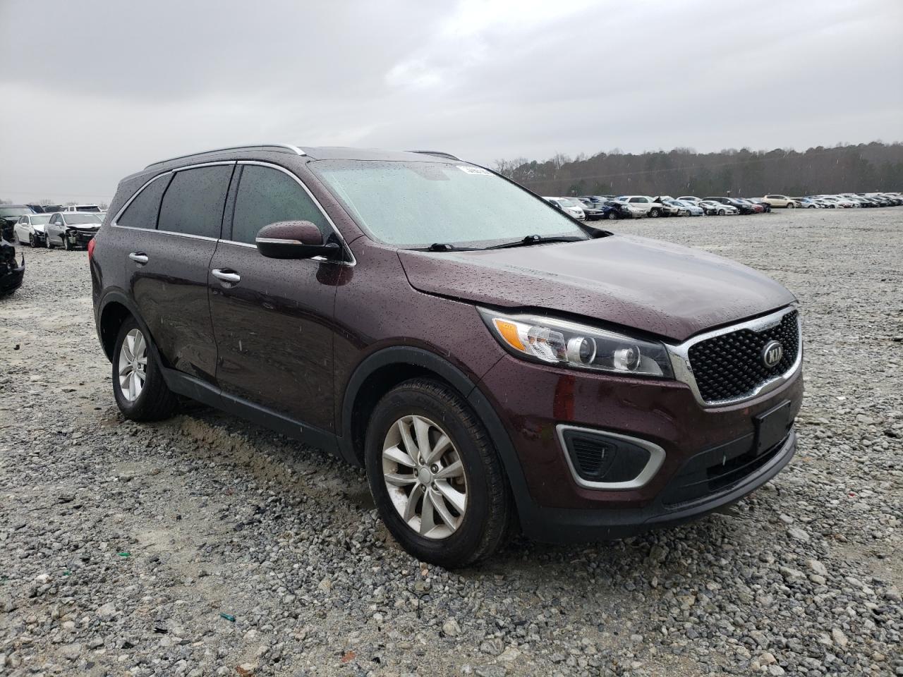 KIA SORENTO LX 2016 with VIN 5XYPG4A34GG008536 - Photo from auction