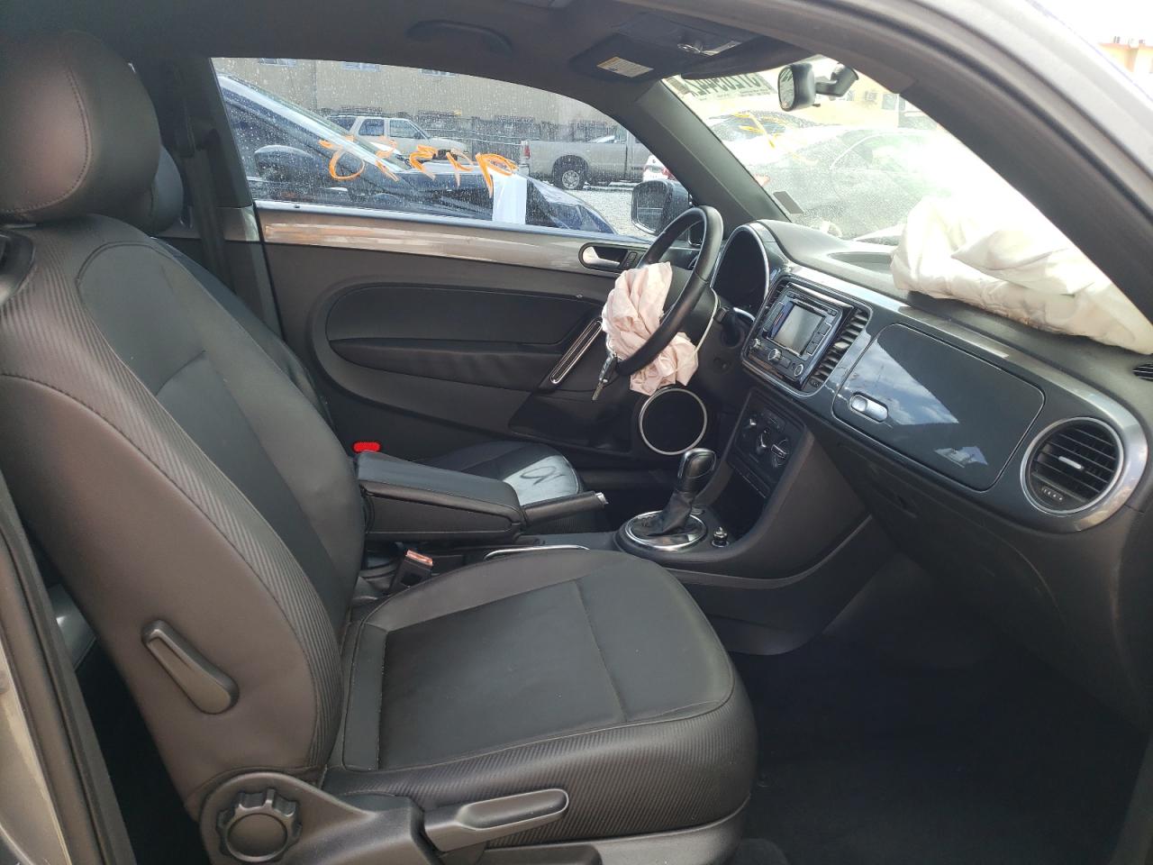 Photo 5 from auction – 2012 VOLKSWAGEN BEETLE with VIN 3VWJX7AT4CM657724