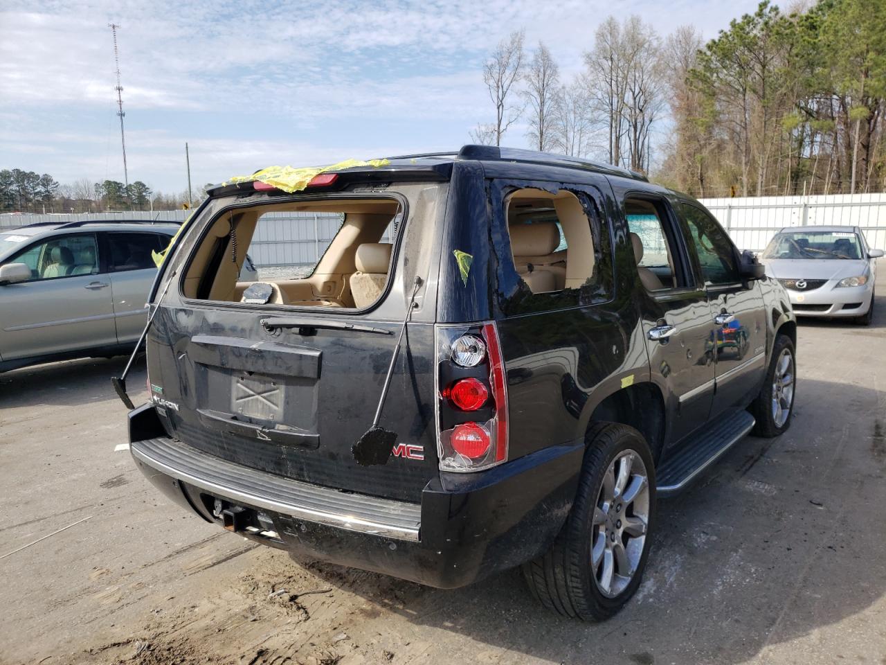 Photo 4 from auction – 2010 GMC YUKON DENA with VIN 1GKUKEEF7AR276408