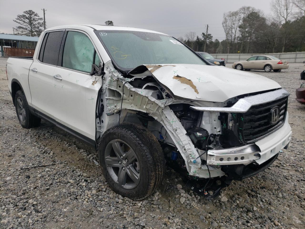 HONDA RIDGELINE 2022 with VIN 5FPYK3F71NB007204 - Photo from auction