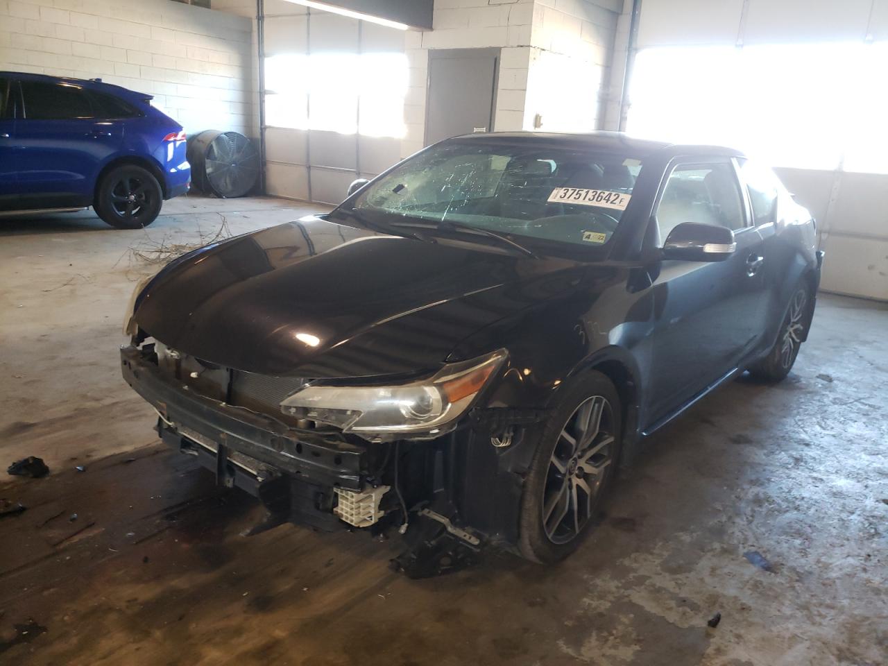 Photo 2 from auction – 2015 TOYOTA SCION TC with VIN JTKJF5C71FJ012467