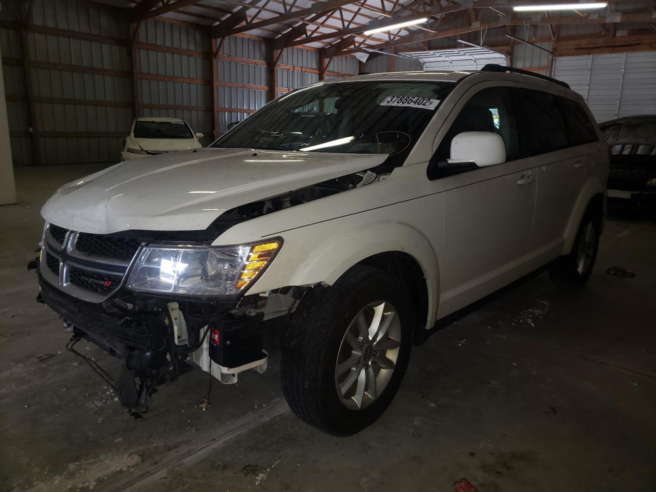 Photo 2 from auction – 2013 DODGE JOURNEY SX with VIN 3C4PDCBB0DT687525