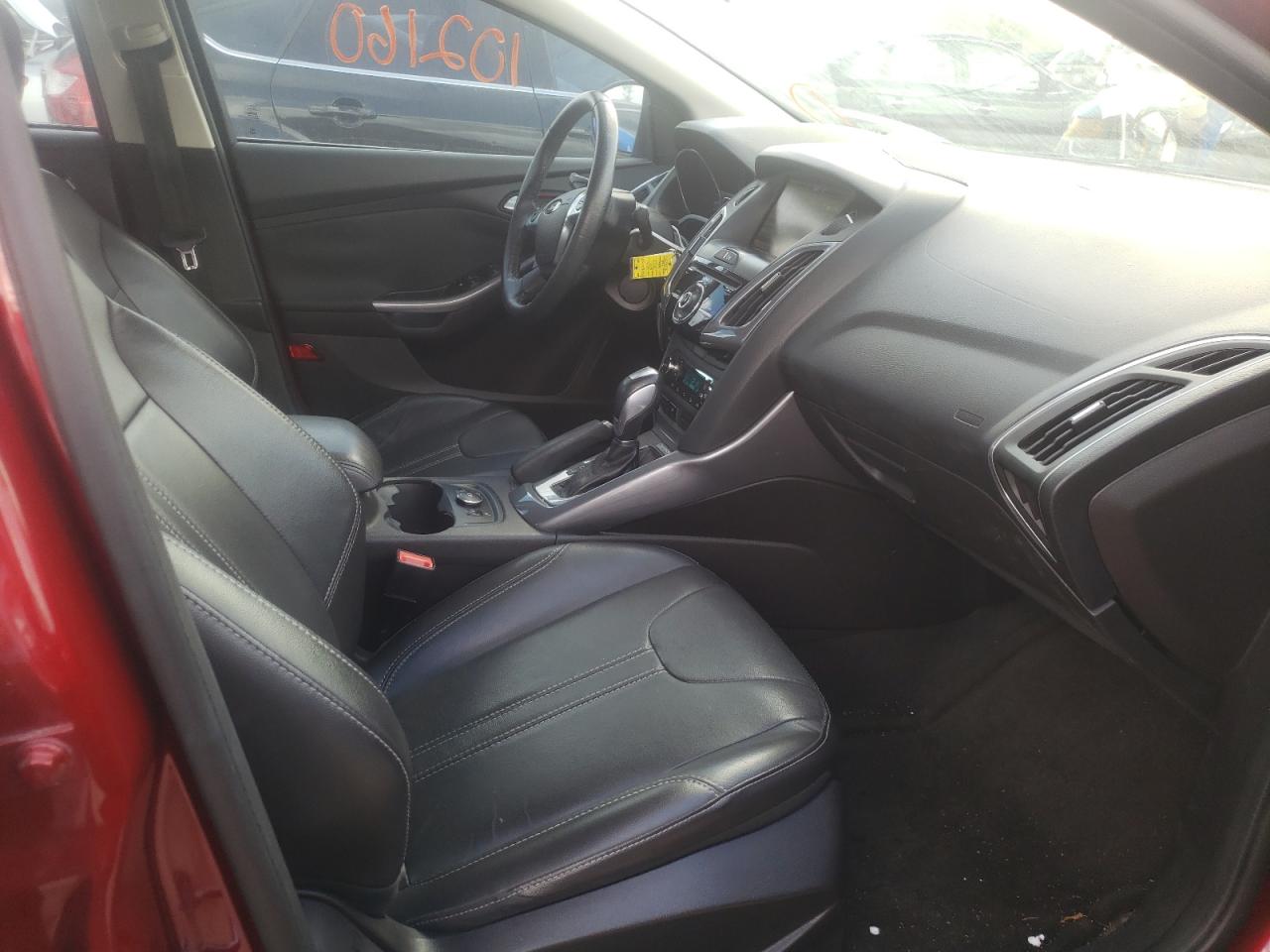 Photo 5 from auction – 2014 FORD FOCUS TITA with VIN 1FADP3J20EL417077