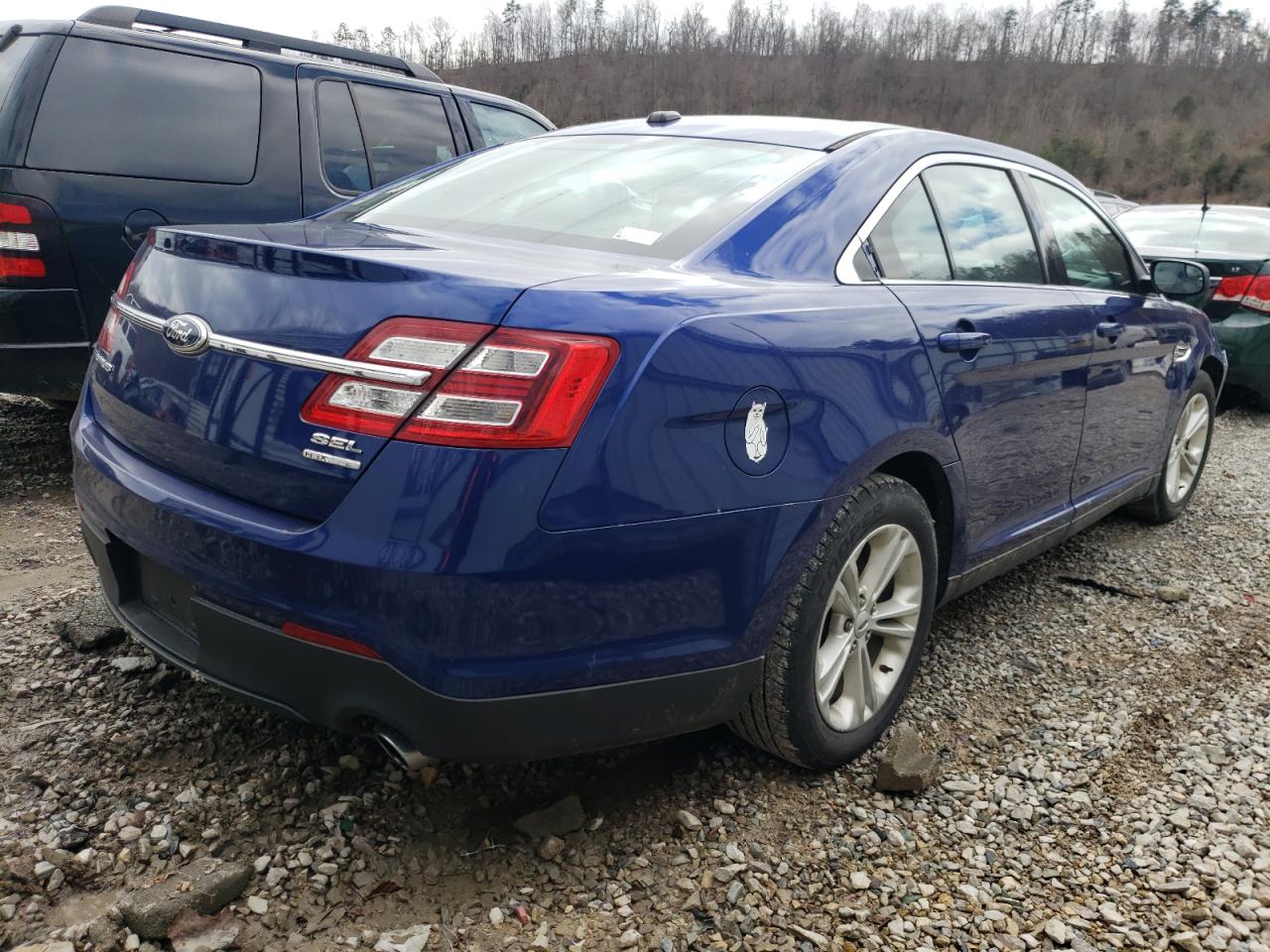 Photo 4 from auction – 2013 FORD TAURUS SEL with VIN 1FAHP2E88DG200961