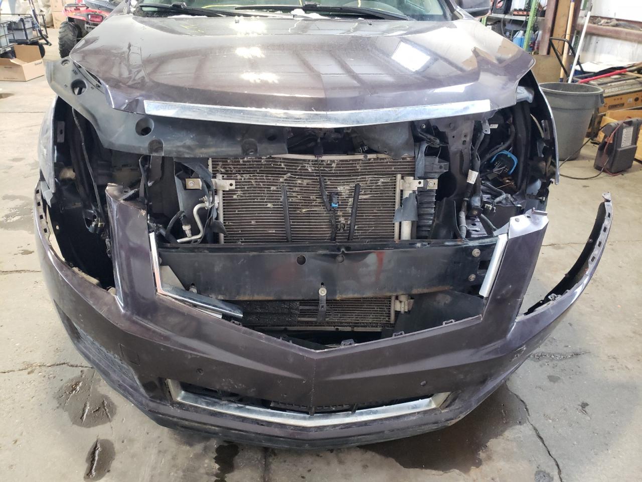 Photo 9 from auction – 2015 CADILLAC SRX LUXURY with VIN 3GYFNEE34FS594874