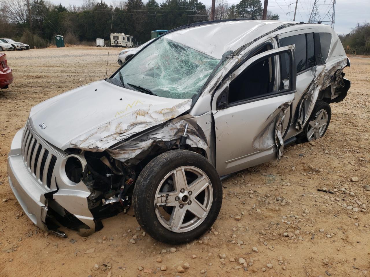 Photo 9 from auction – 2010 JEEP COMPASS SP with VIN 1J4NT4FB3AD593824