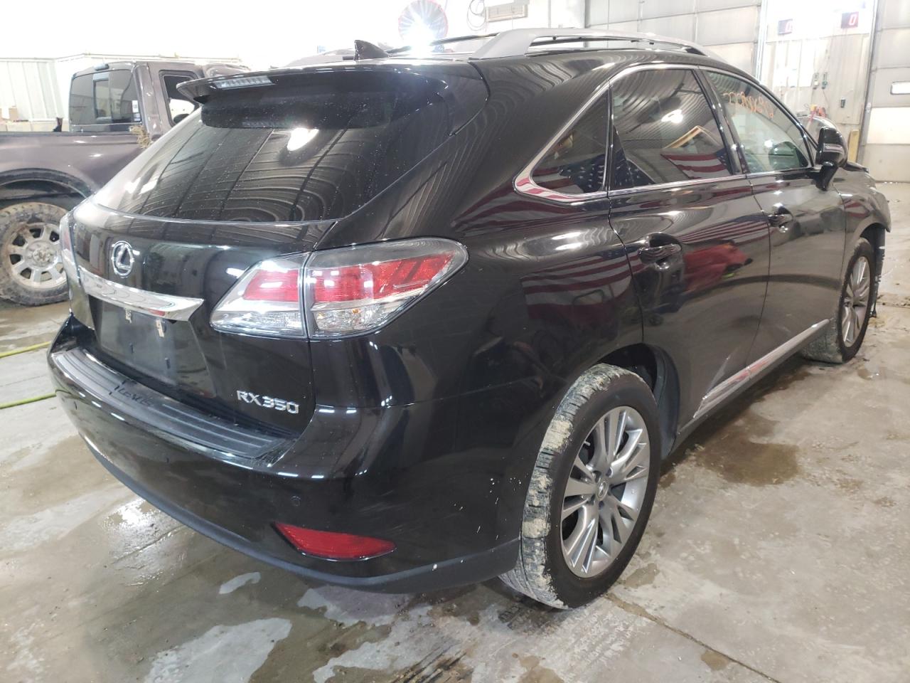Photo 4 from auction – 2014 LEXUS RX 350 BAS with VIN 2T2BK1BA7EC239049