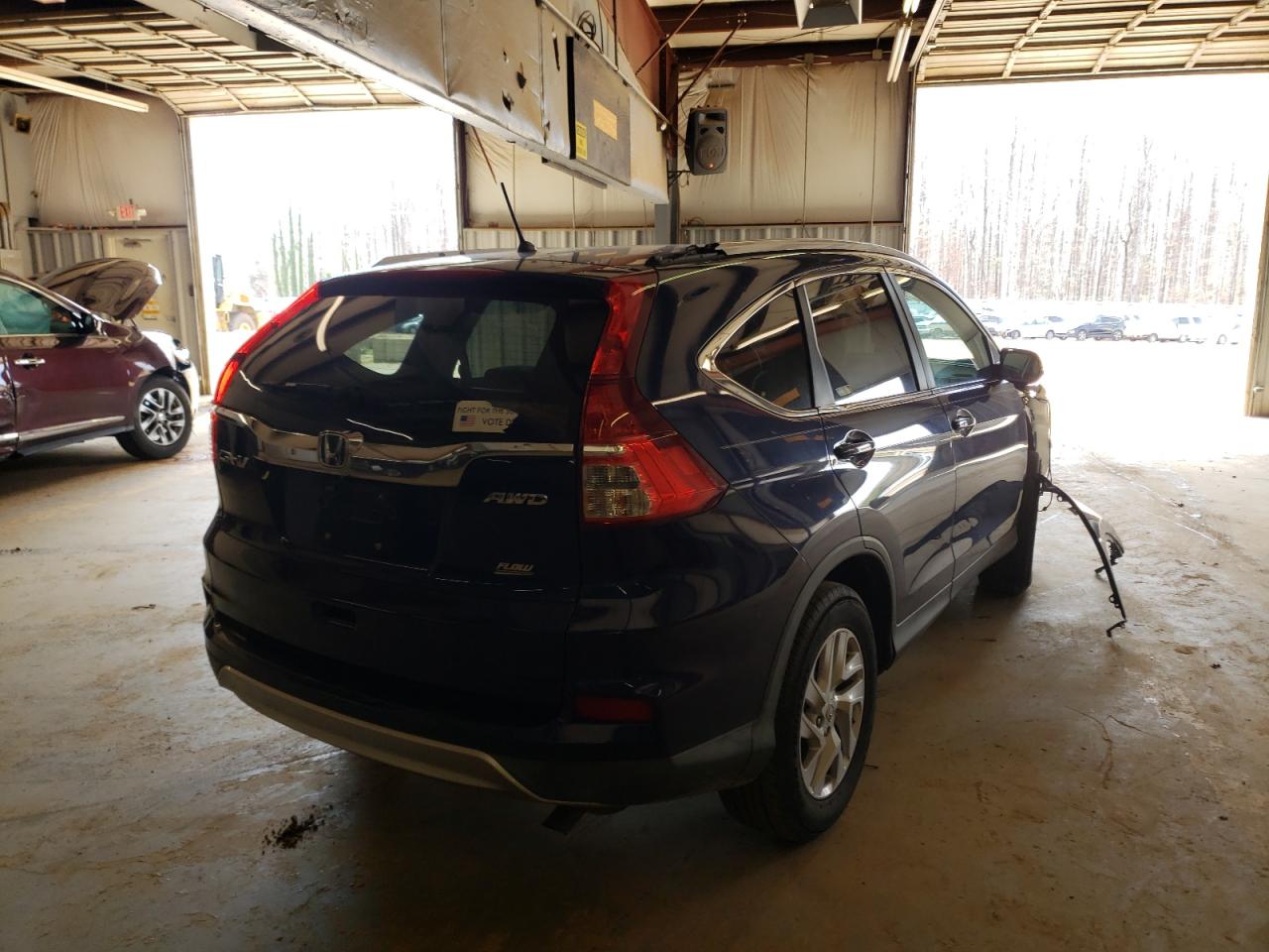 Photo 4 from auction – 2015 HONDA CR-V EX with VIN 2HKRM4H58FH634347