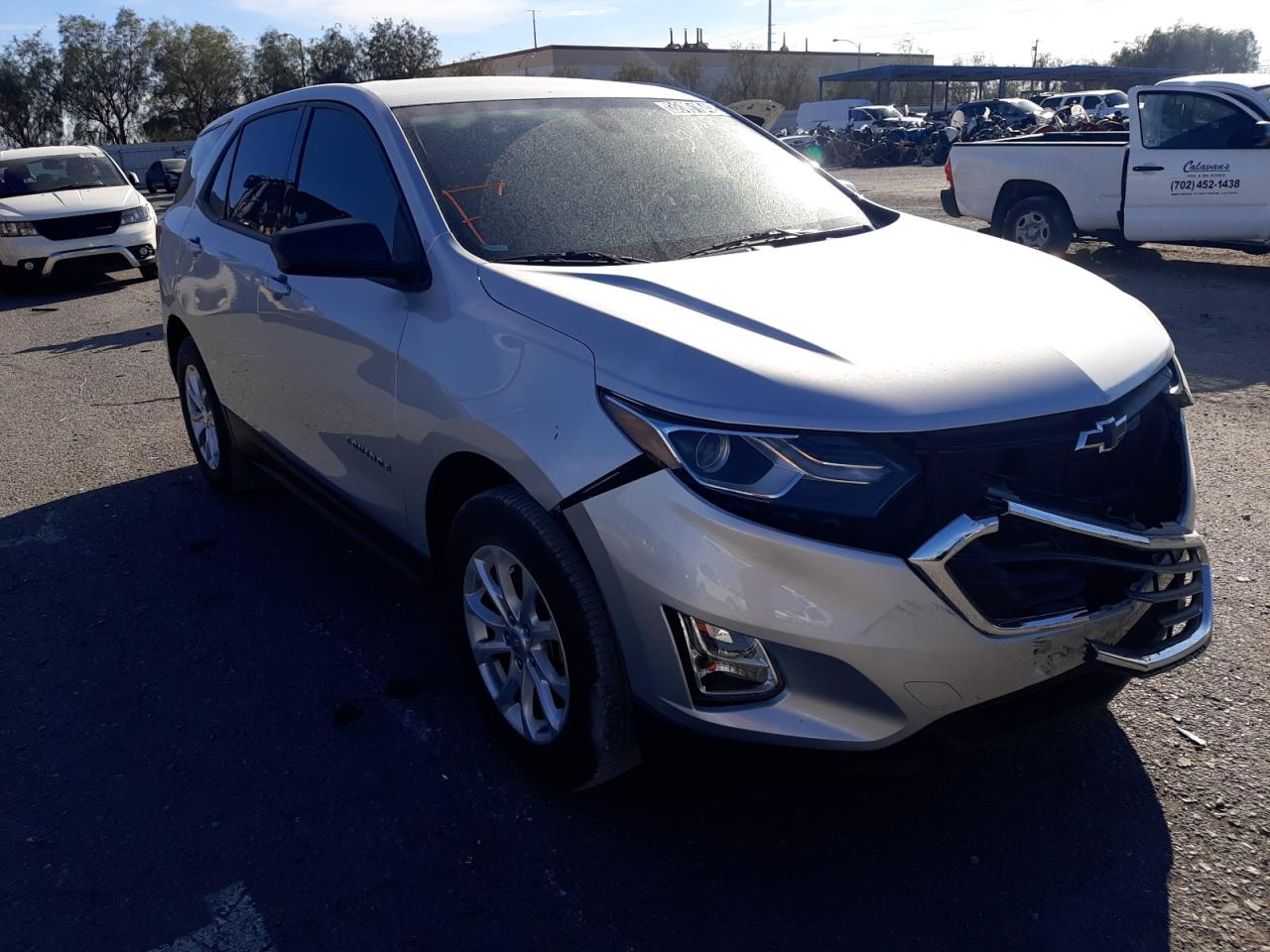 CHEVROLET EQUINOX LS 2019 with VIN 3GNAXHEV4KS665263 - Photo from auction