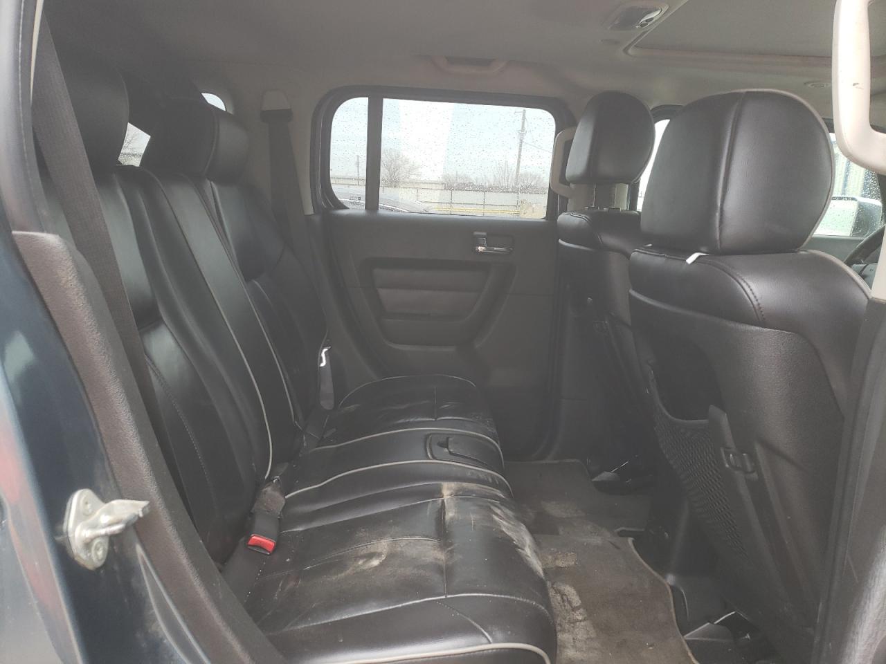 Photo 6 from auction – 2006 HUMMER H3 with VIN 5GTDN136468130830