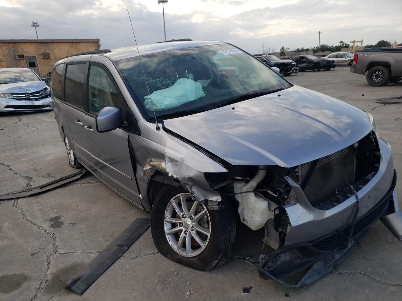 DODGE GRAND CARA 2016 с VIN 2C4RDGCG0GR380339 - Фото с аукциона