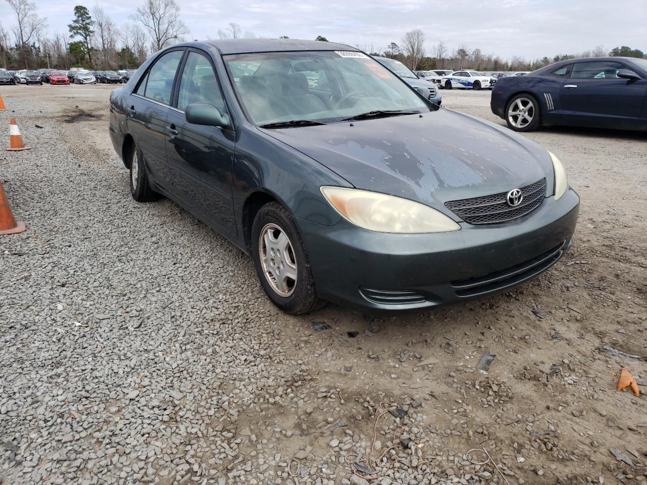 TOYOTA CAMRY LE 2002 with VIN 4T1BF32K12U536406 - Photo from auction