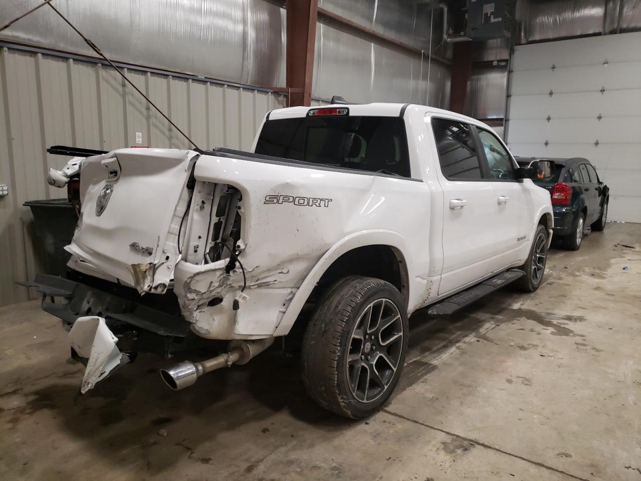 Photo 4 from auction – 2021 RAM 1500 LARAM with VIN 1C6SRFJT2MN534904