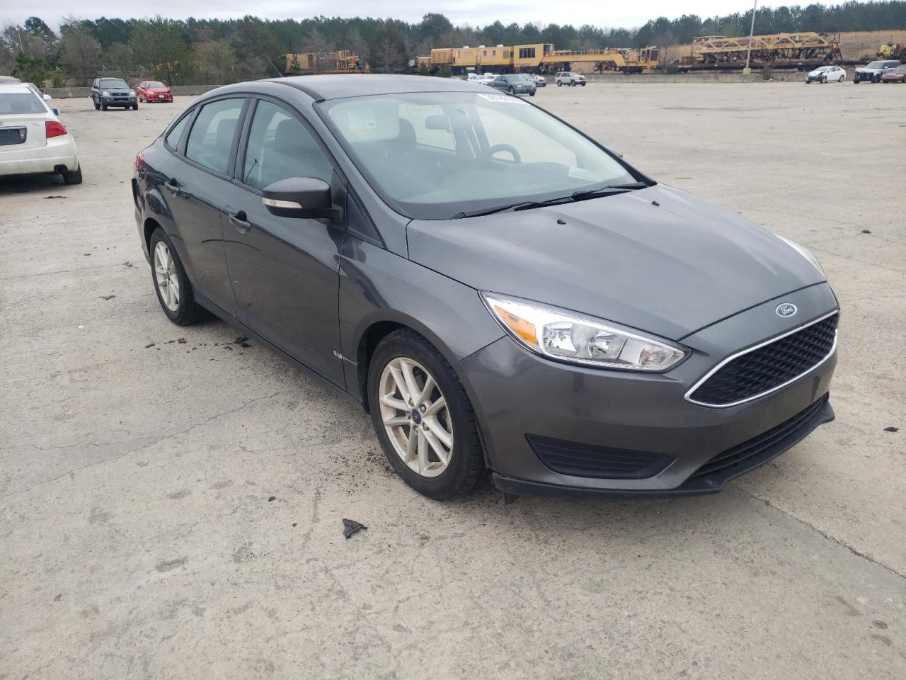 FORD FOCUS SE 2017 with VIN 1FADP3F27HL208304 - Photo from auction