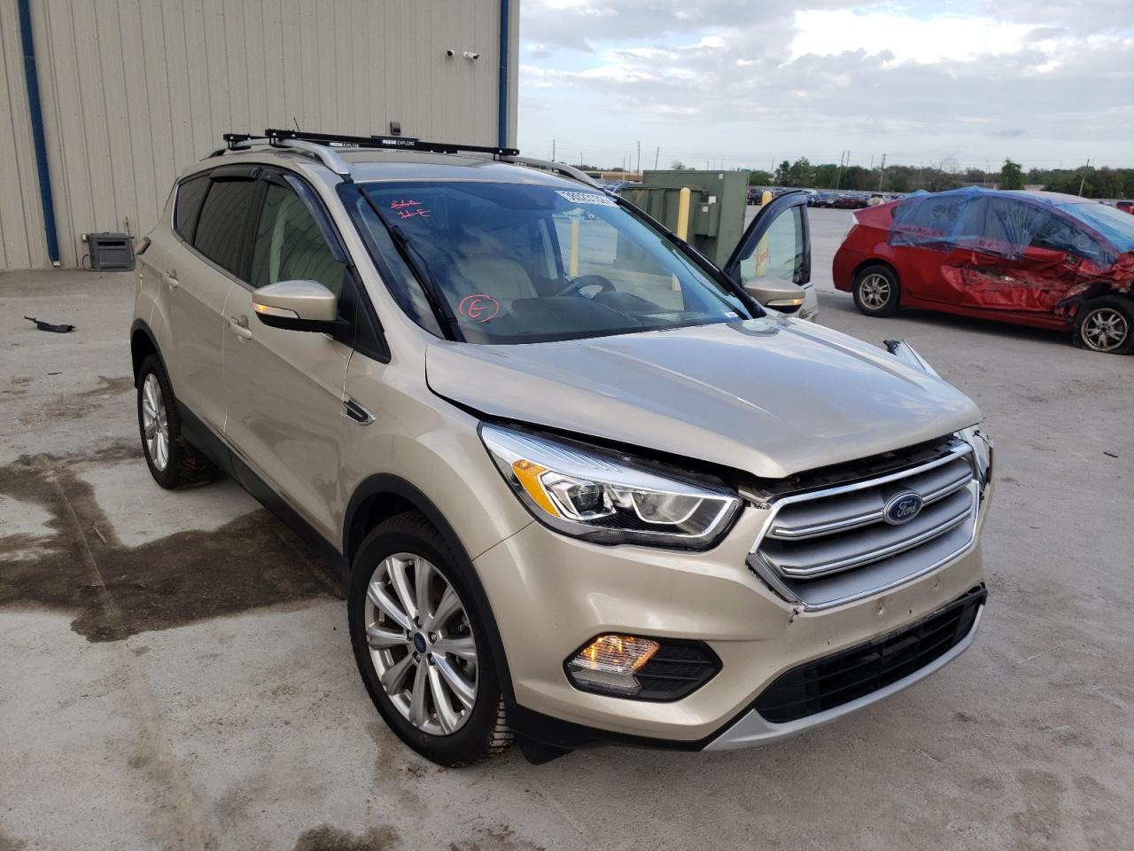 FORD ESCAPE TIT 2017 with VIN 1FMCU0J92HUD84457 - Photo from auction