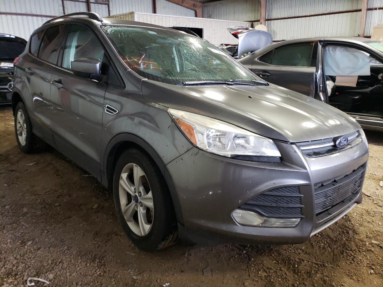 FORD ESCAPE SE 2014 with VIN 1FMCU0GX6EUE39011 - Photo from auction