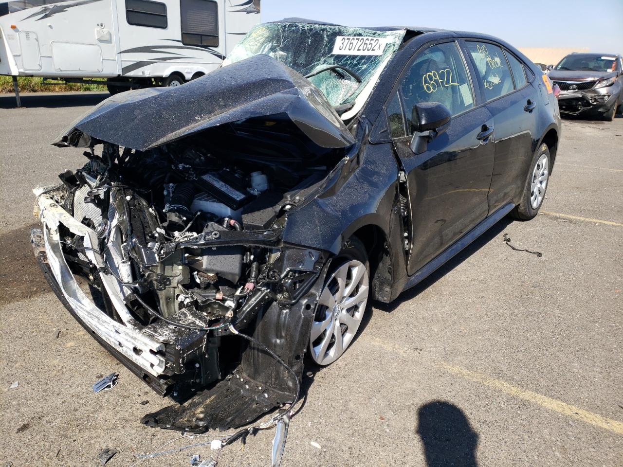 Photo 2 from auction – 2022 TOYOTA COROLLA LE with VIN JTDEPMAEXNJ214319