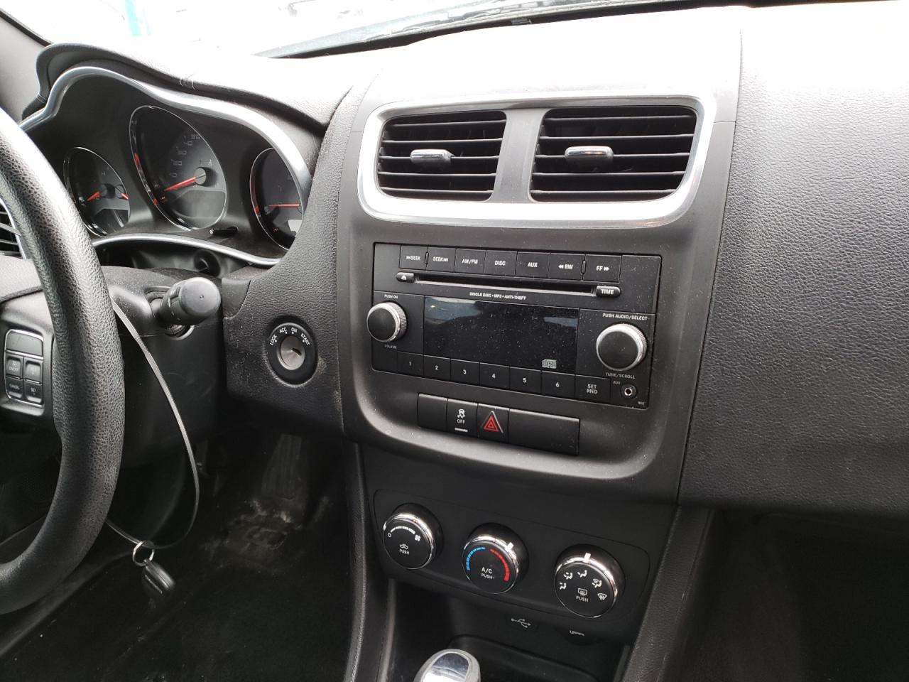 Photo 9 from auction – 2013 DODGE AVENGER SE with VIN 1C3CDZAB8DN719080