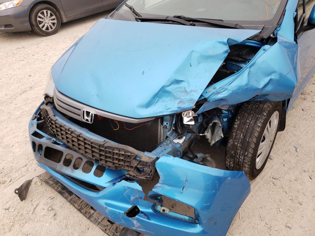 Photo 9 from auction – 2011 HONDA INSIGHT with VIN JHMZE2H3XBS011337