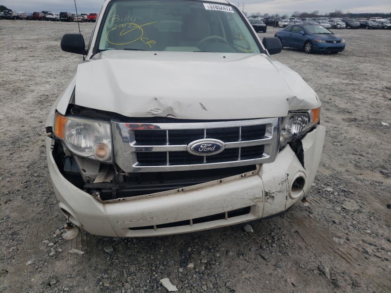Photo 9 from auction – 2010 FORD ESCAPE XLT with VIN 1FMCU0DGXAKC65678