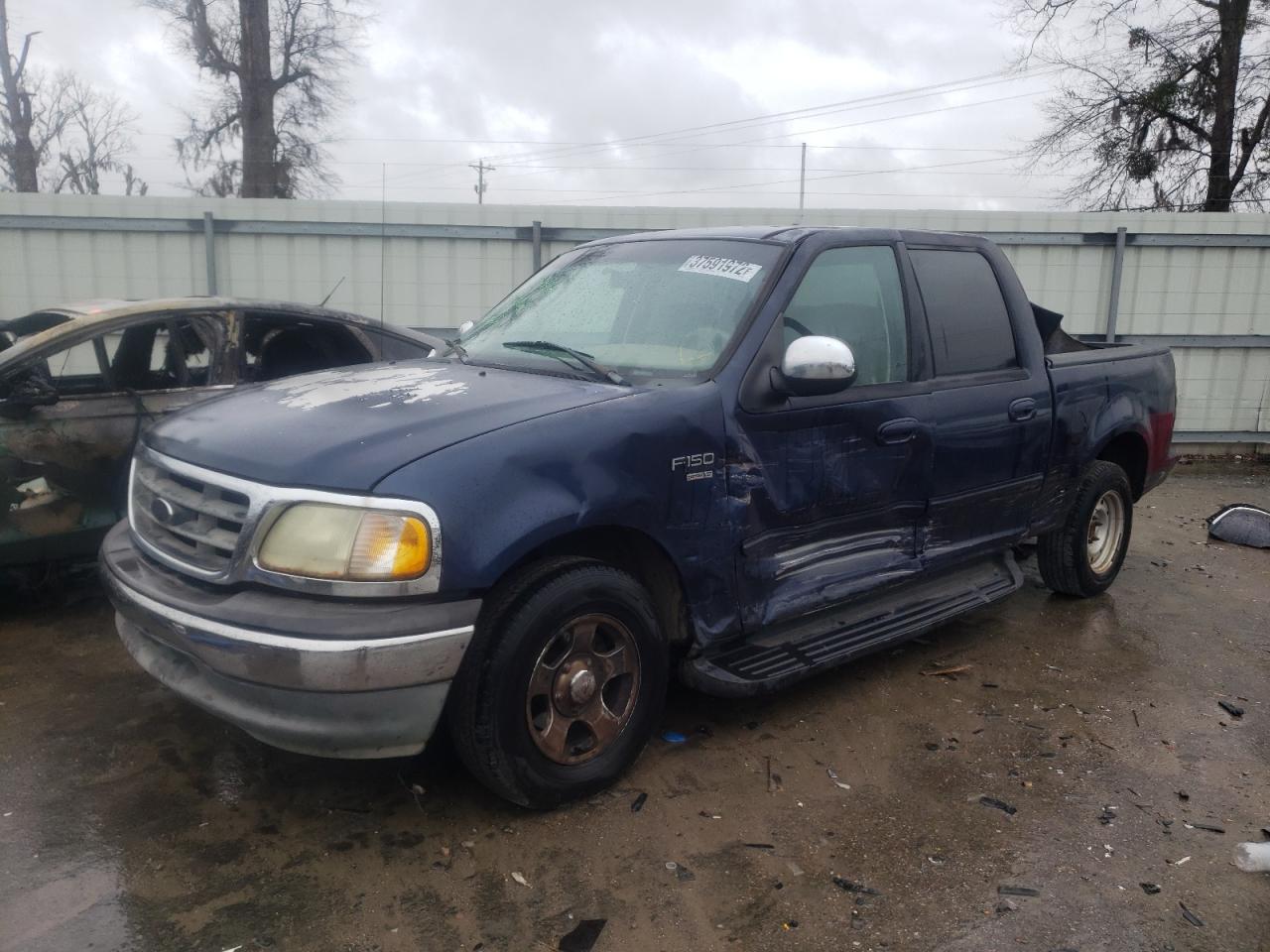 Photo 2 from auction – 2002 FORD F150 SUPER with VIN 1FTRW07L52KD37020