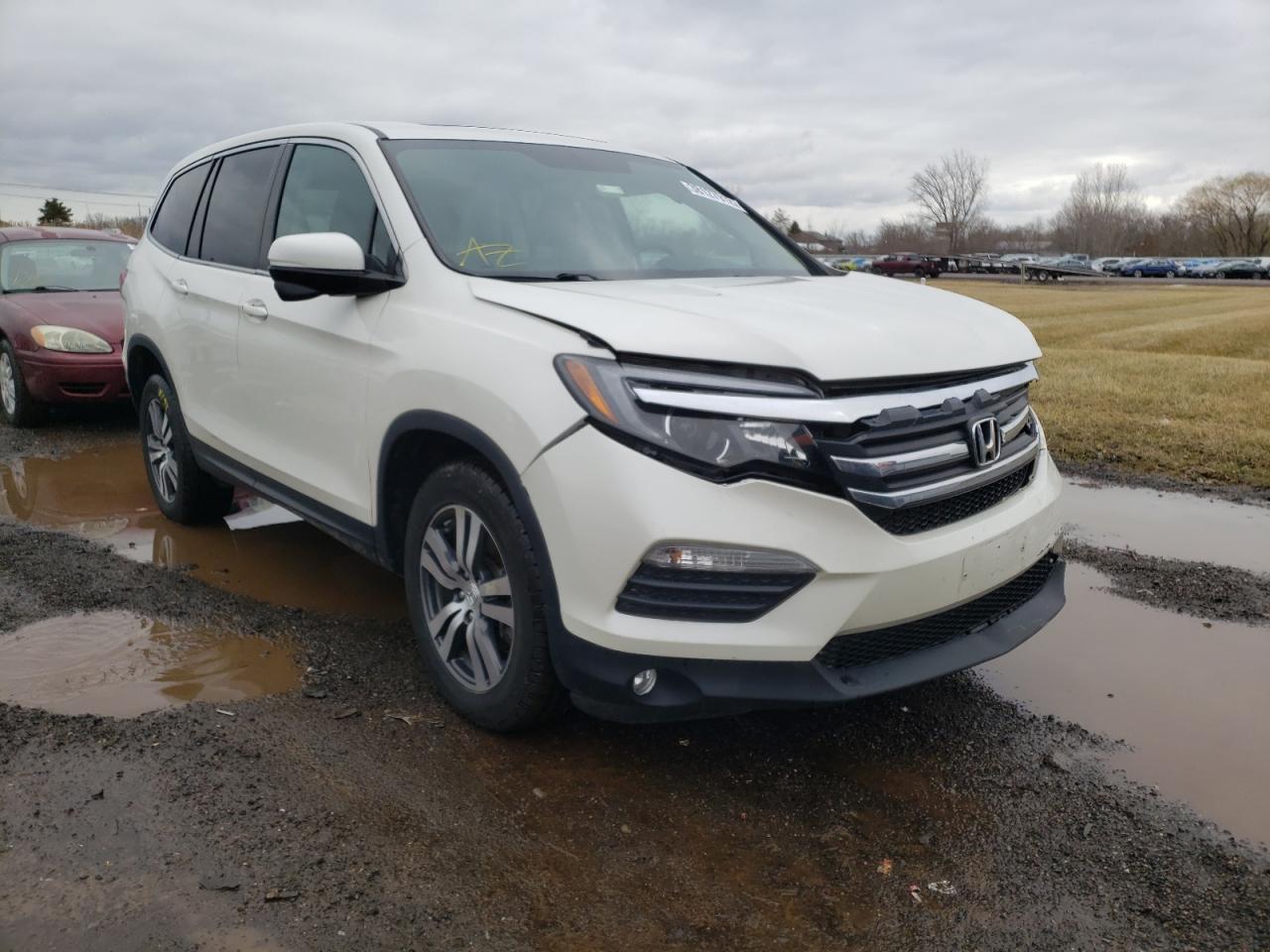 HONDA PILOT 2017 with VIN 5FNYF6H58HB040764 - Photo from auction