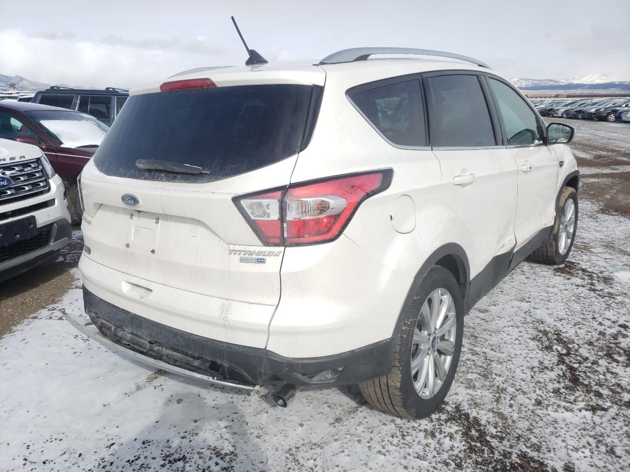 Photo 4 from auction – 2018 FORD ESCAPE TIT with VIN 1FMCU9J99JUB26690