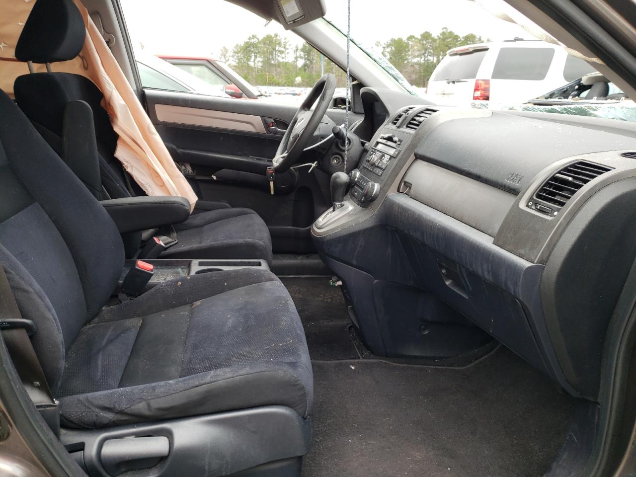 Photo 5 from auction – 2011 HONDA CR-V SE with VIN 5J6RE3H47BL034353
