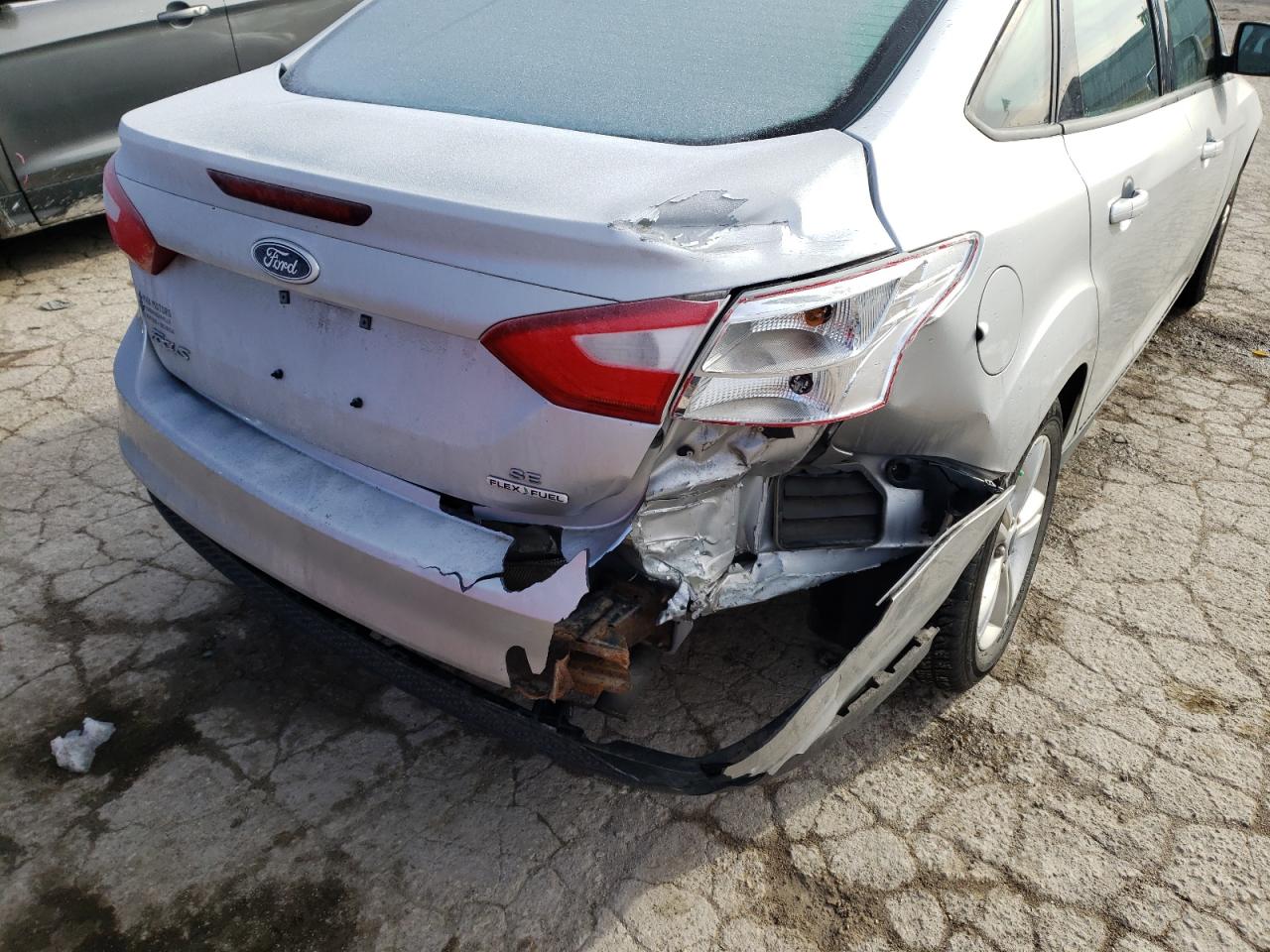Photo 9 from auction – 2013 FORD FOCUS SE with VIN 1FADP3F24DL283200