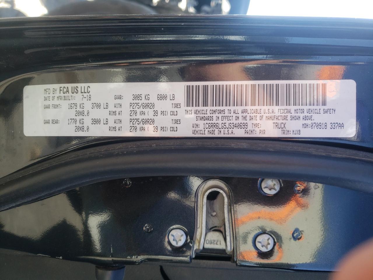 Photo 10 from auction – 2018 RAM 1500 SLT with VIN 1C6RR6LG5JS340699