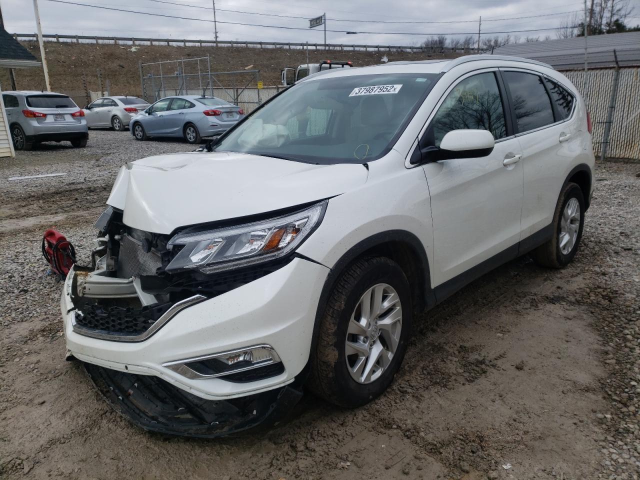 Photo 2 from auction – 2015 HONDA CR-V EXL with VIN 5J6RM4H76FL065750
