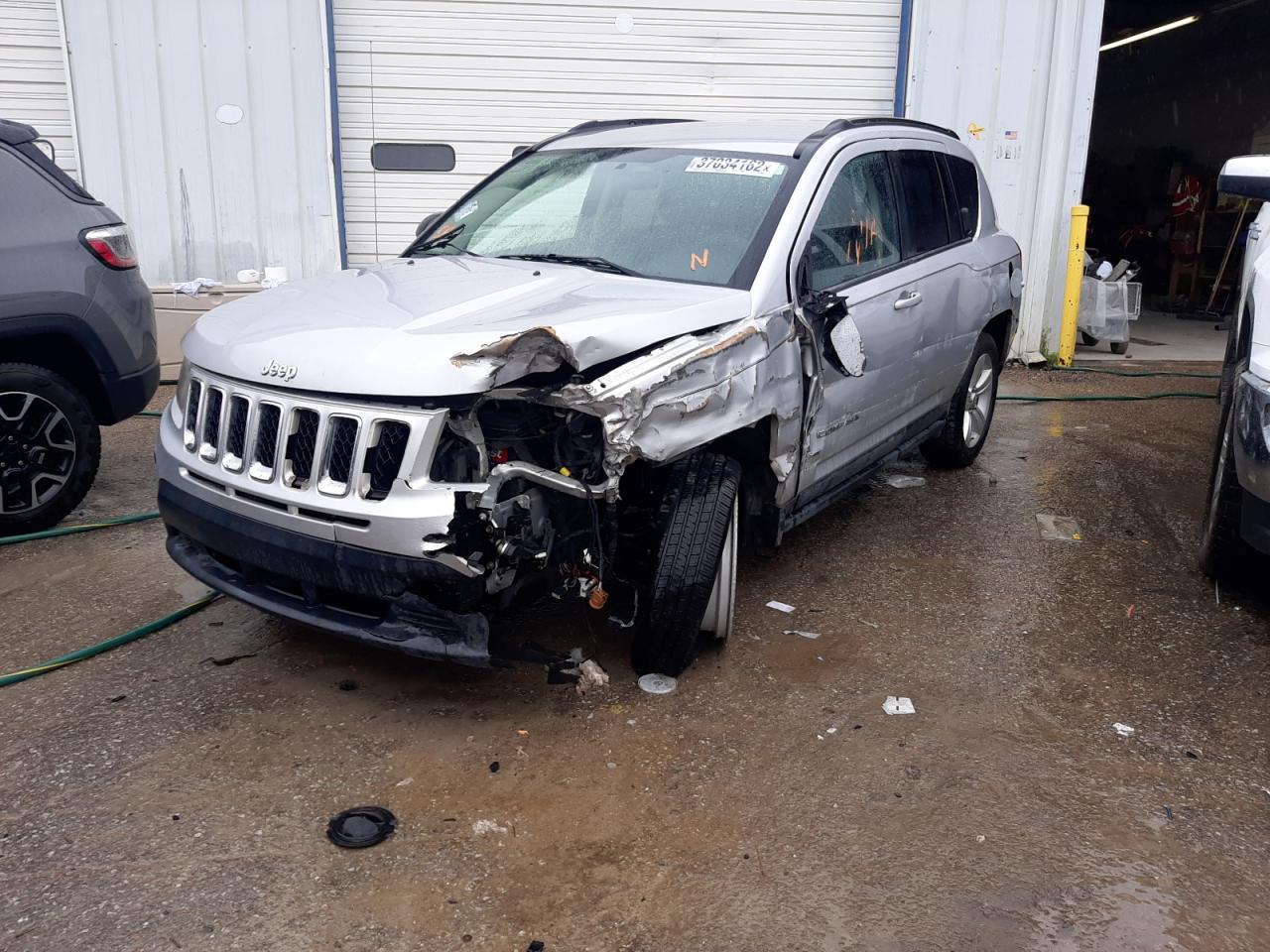 Photo 2 from auction – 2011 JEEP COMPASS SP with VIN 1J4NT1FA4BD180981