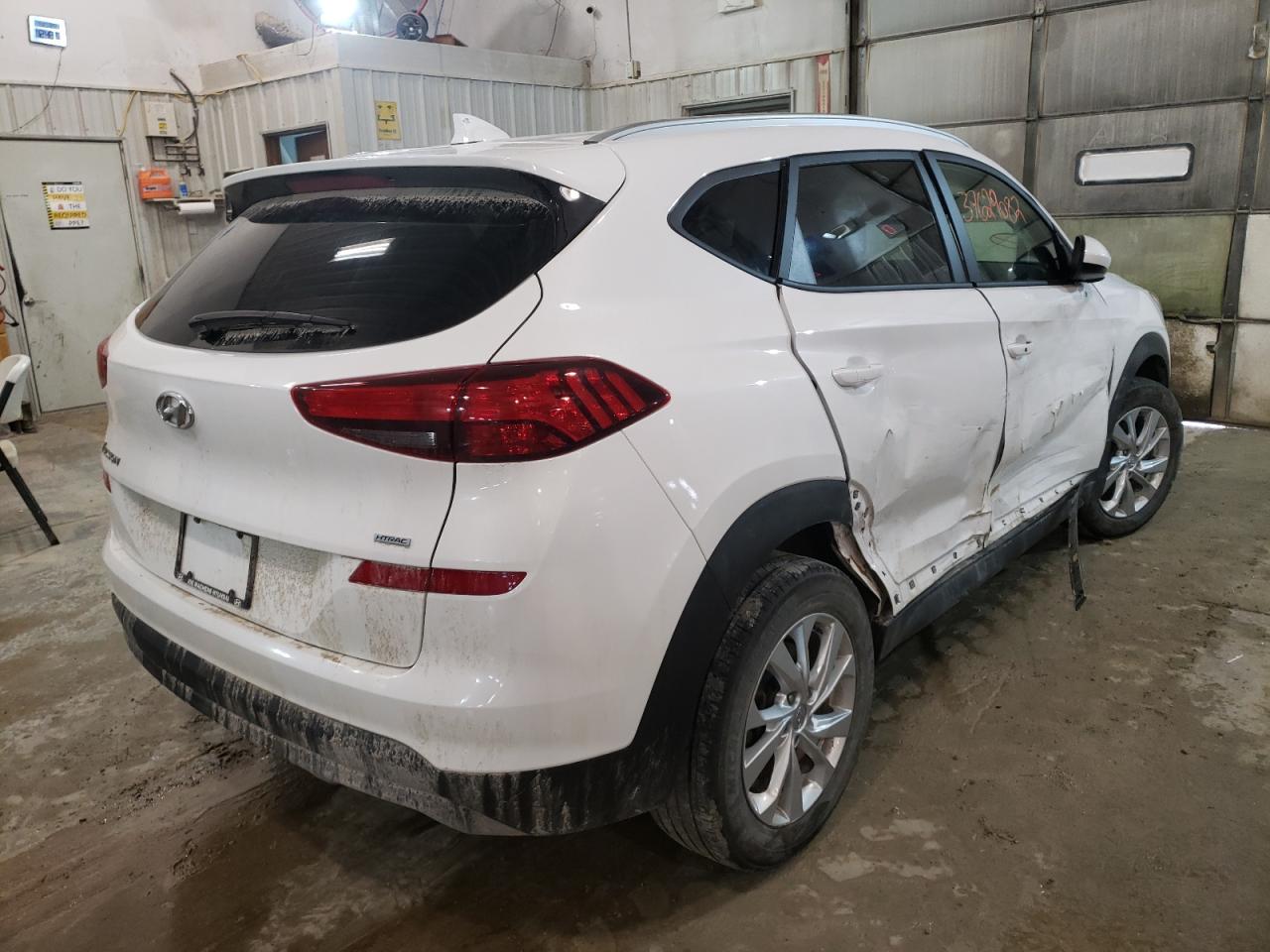 Photo 4 from auction – 2020 HYUNDAI TUCSON LIM with VIN KM8J3CA47LU271757