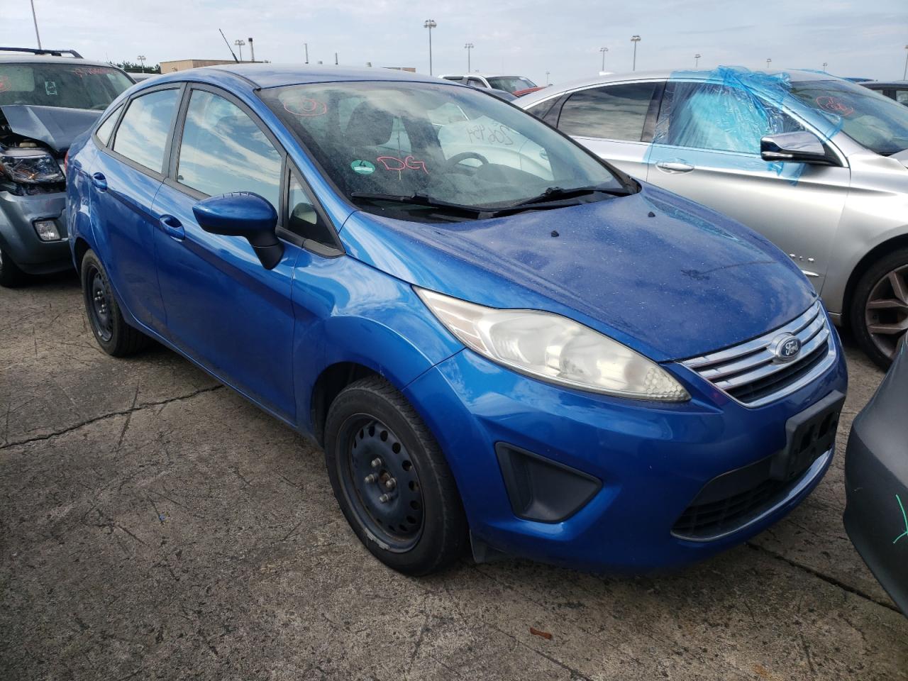 FORD FIESTA SE 2011 with VIN 3FADP4BJ7BM125559 - Photo from auction