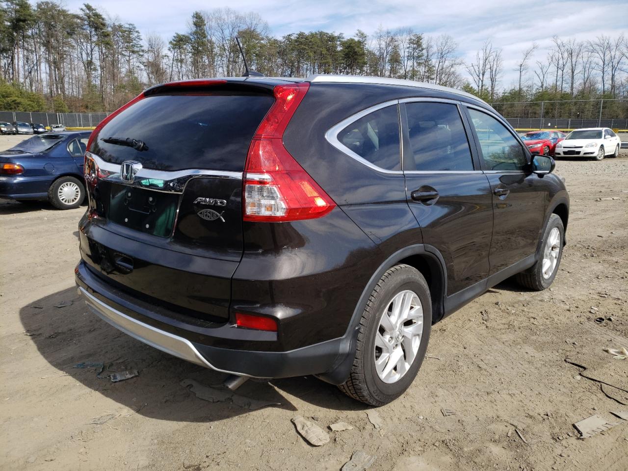 Photo 4 from auction – 2016 HONDA CR-V EXL with VIN 2HKRM4H71GH638646