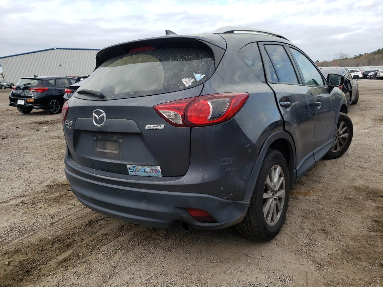 Photo 4 from auction – 2016 MAZDA UK with VIN JM3KE2CY4G0811602