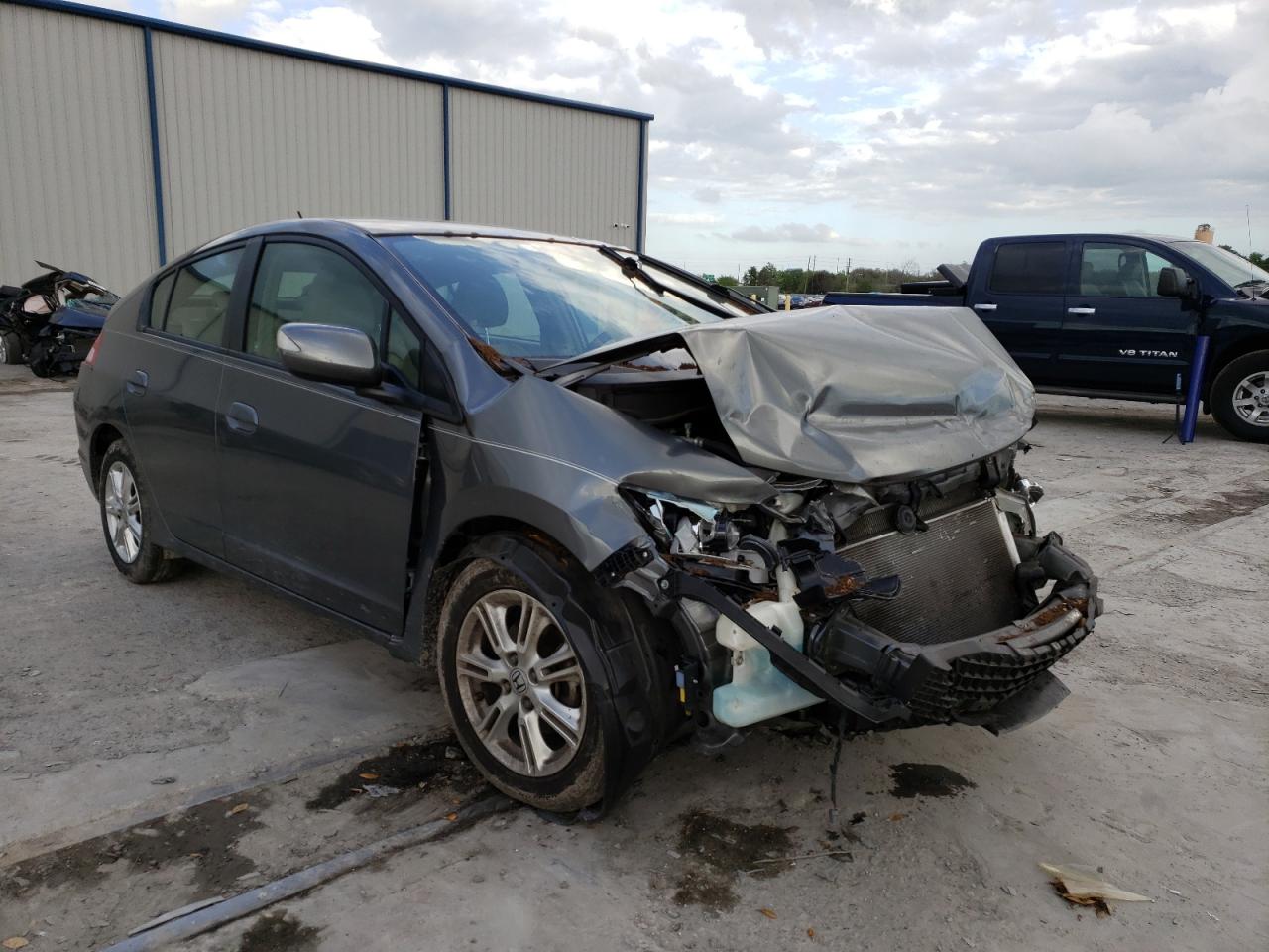 HONDA INSIGHT EX 2010 with VIN JHMZE2H79AS002520 - Photo from auction