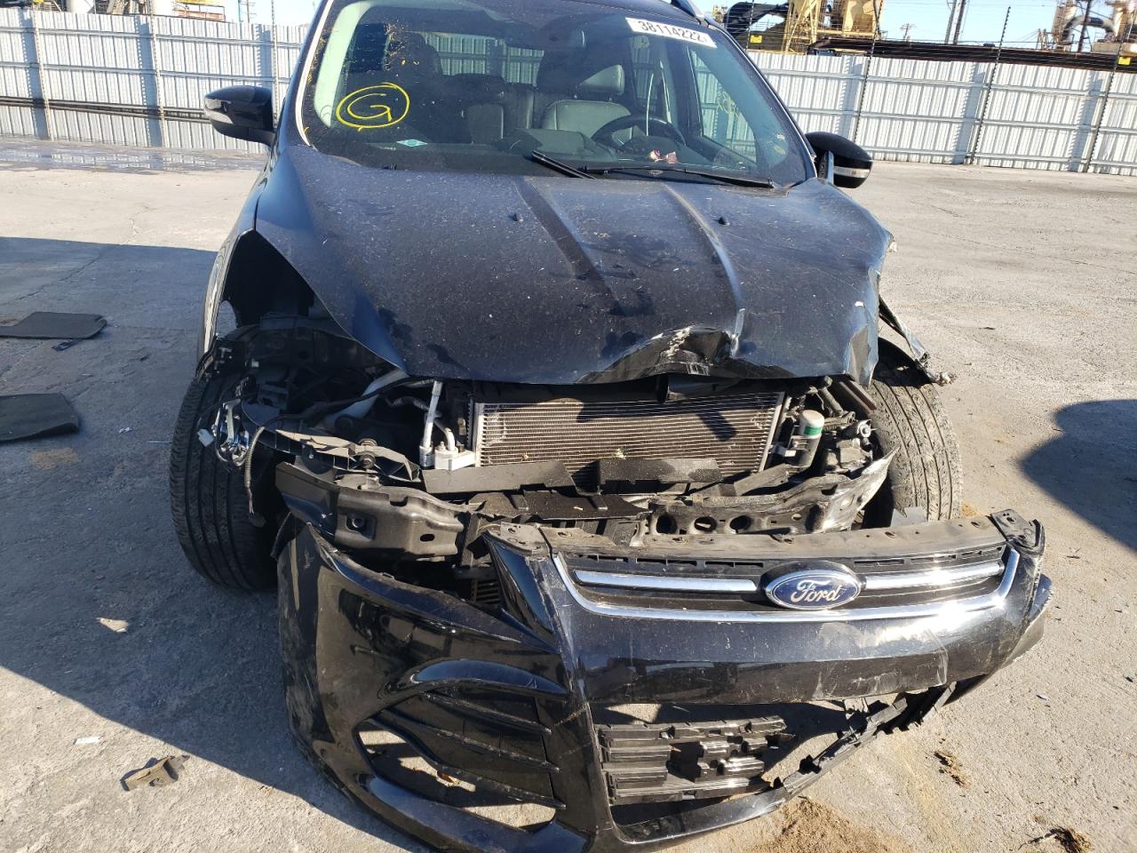 Photo 9 from auction – 2016 FORD ESCAPE TIT with VIN 1FMCU0J98GUB38592