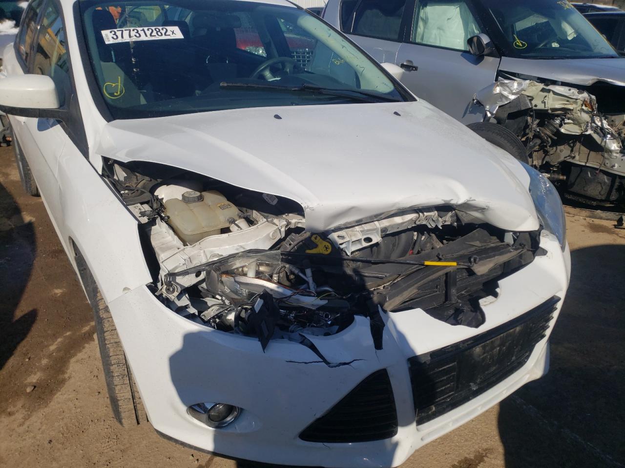 Photo 9 from auction – 2012 FORD FOCUS SE with VIN 1FAHP3F25CL267443