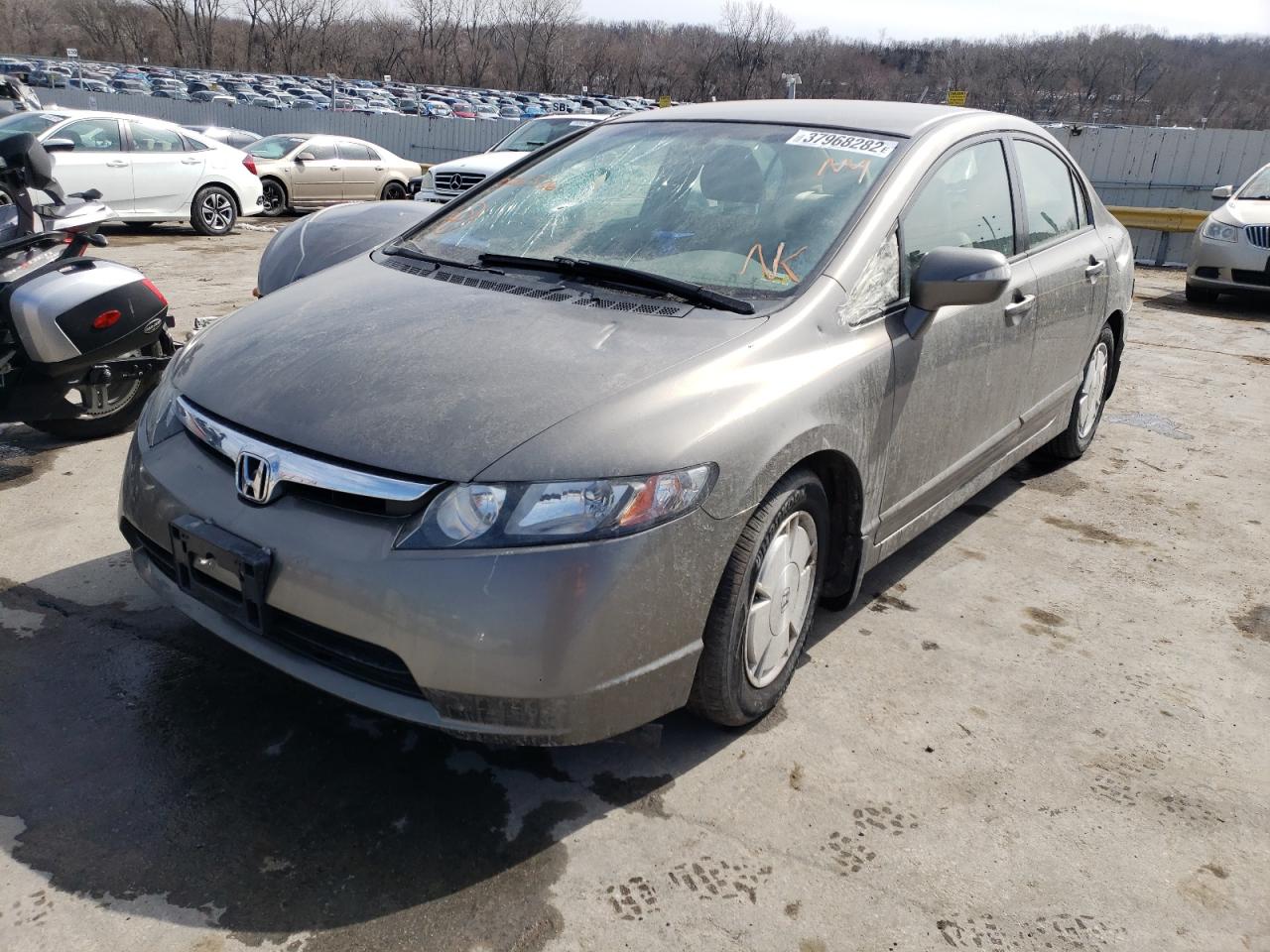 Photo 2 from auction – 2006 HONDA CIVIC HYBR with VIN JHMFA36286S026536