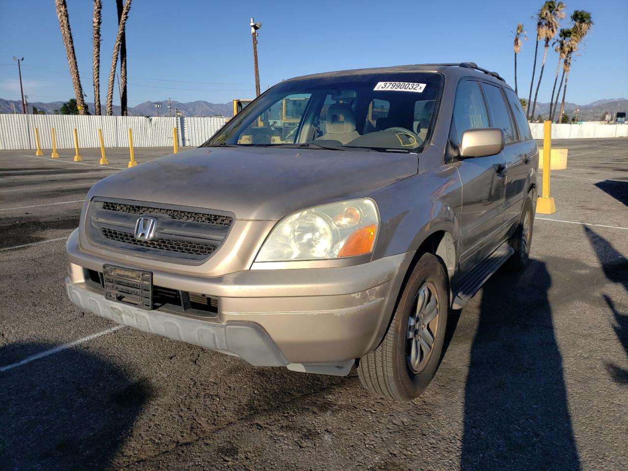 Photo 2 from auction – 2004 HONDA PILOT EX with VIN 2HKYF18464H589711