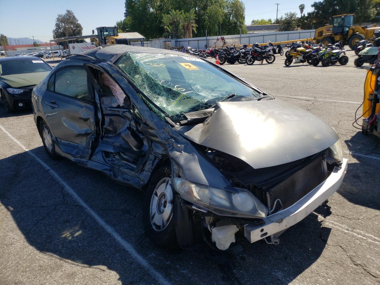 HONDA CIVIC HYBR 2010 with VIN JHMFA3F20AS004796 - Photo from auction
