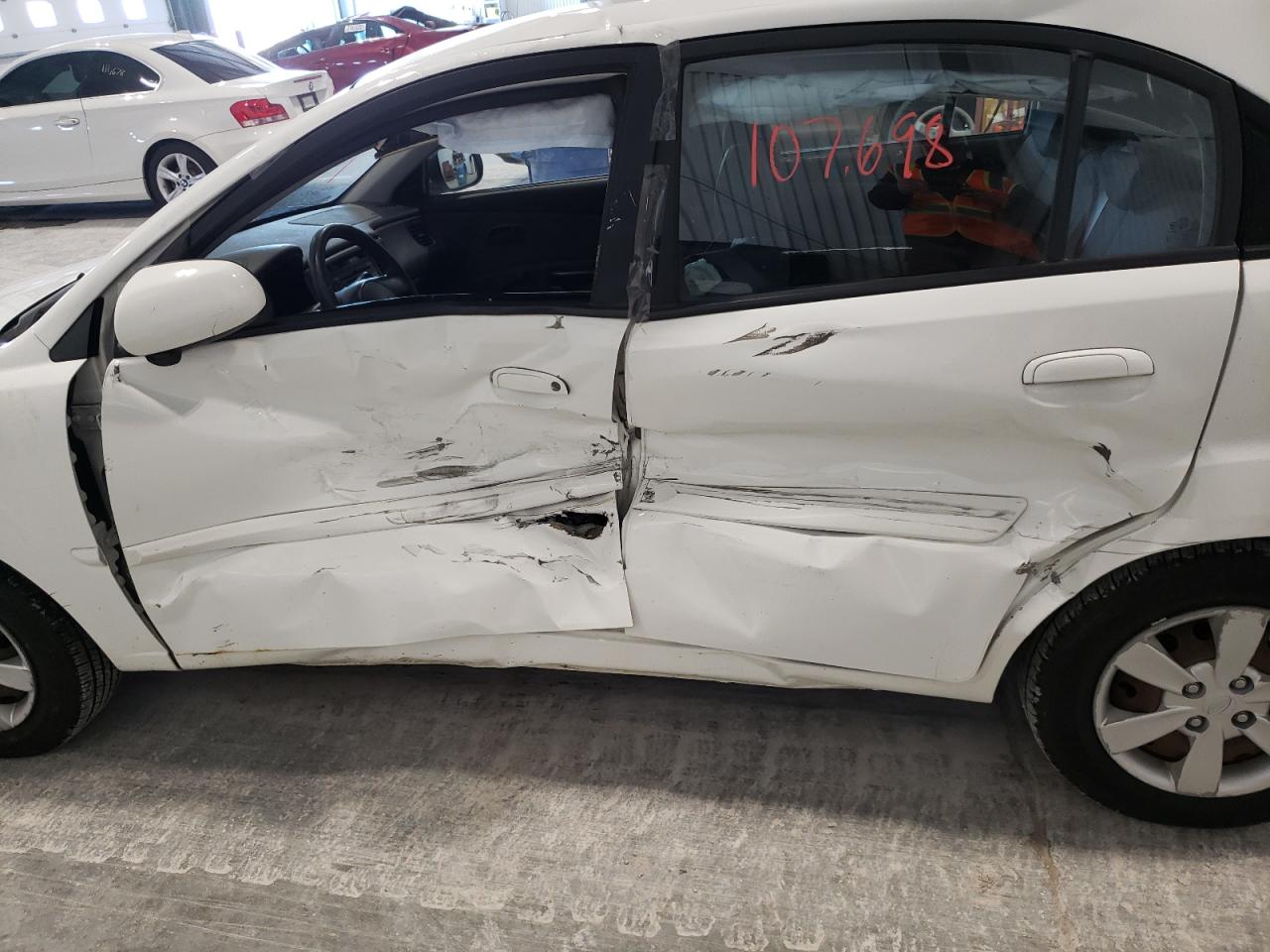 Photo 9 from auction – 2011 KIA RIO BASE with VIN KNADH5A39B6769108
